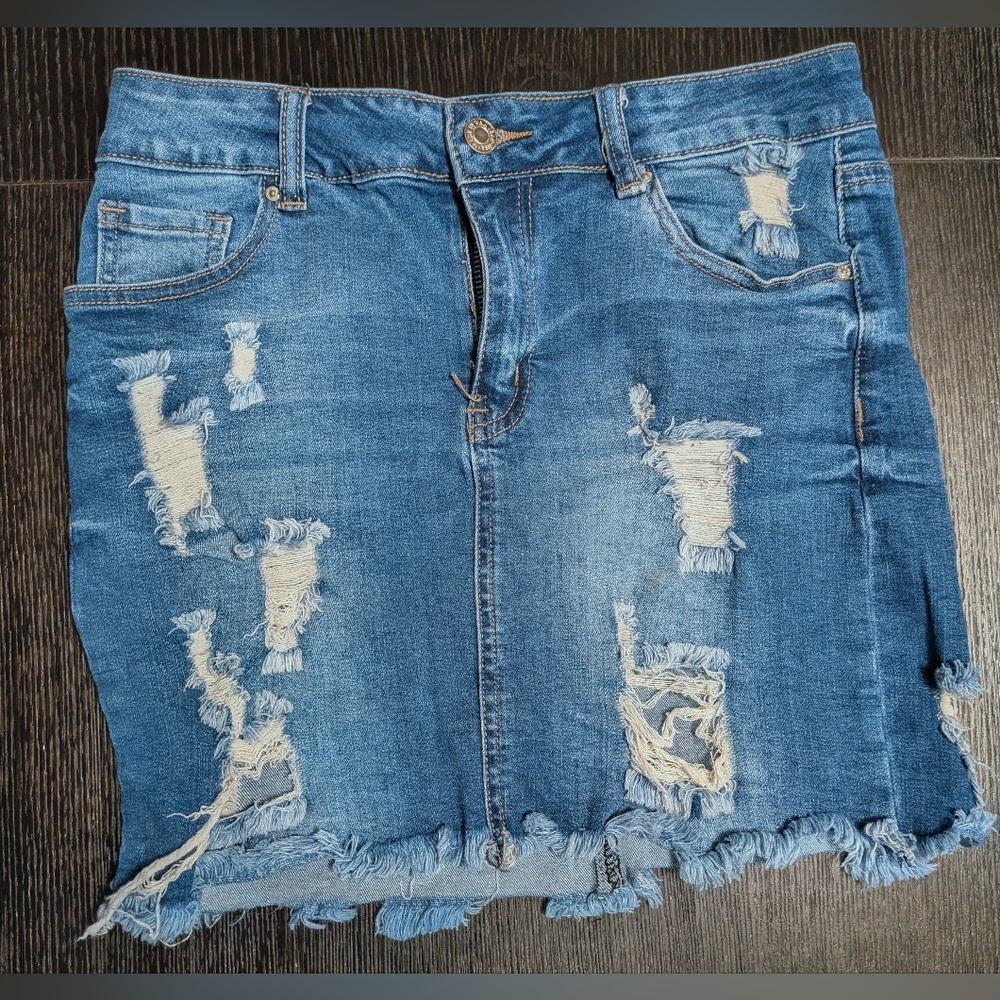 Wax Jean Distressed Mini Skirt